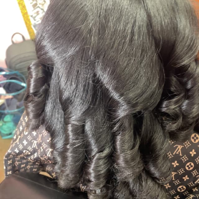 Silk Press and Steam Treatment at The Candy J Agency LLC. in Huntsville, AL
